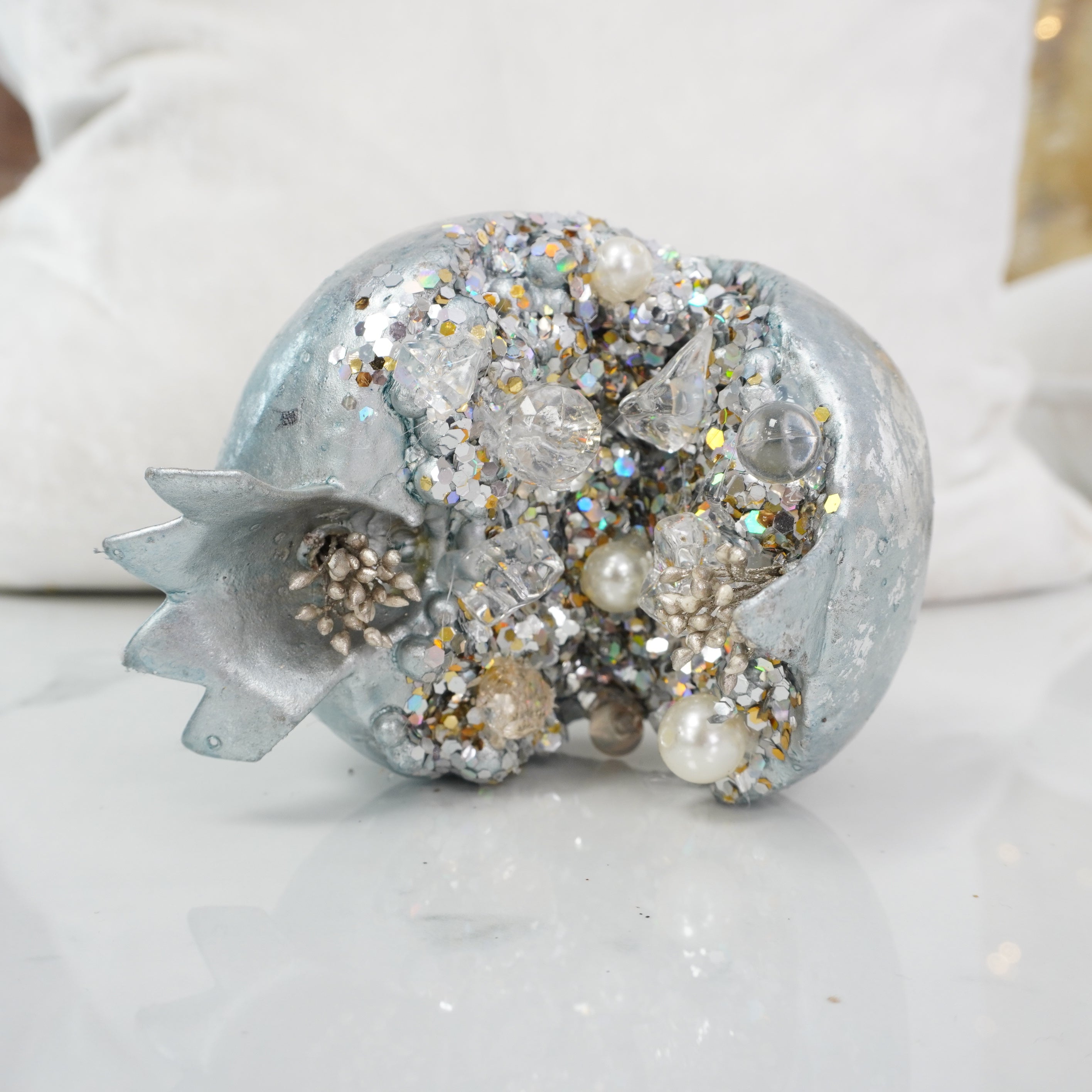 Dusty blue jeweled pomegranate